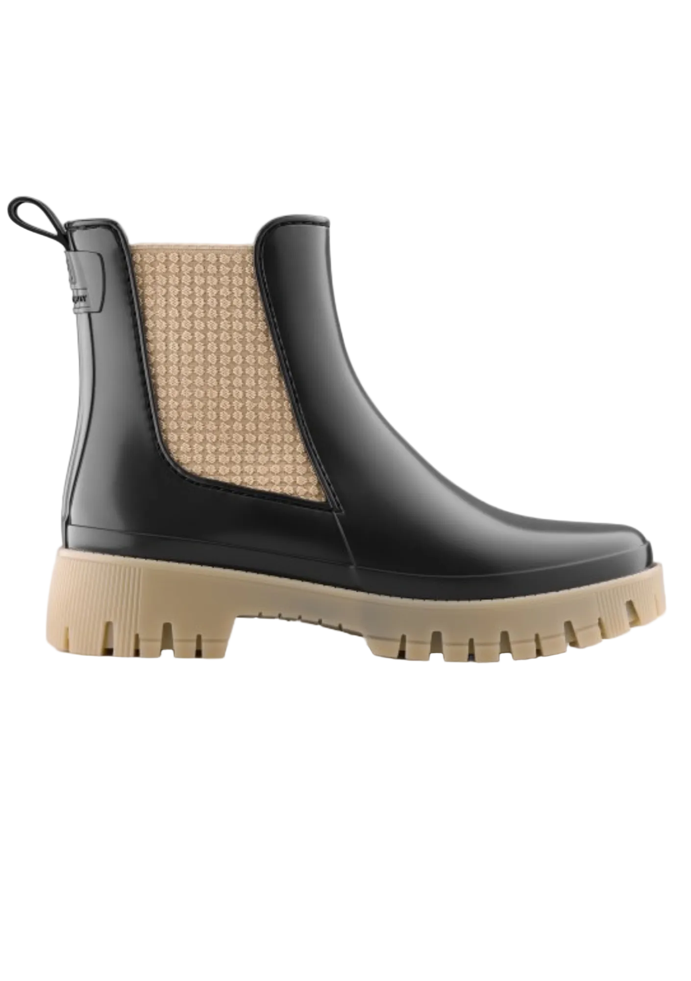 Black Chelsea boot with beige sole on a white background