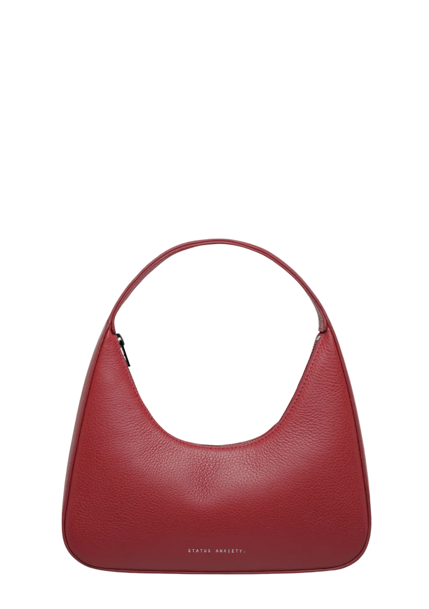 Red handbag on a light beige background