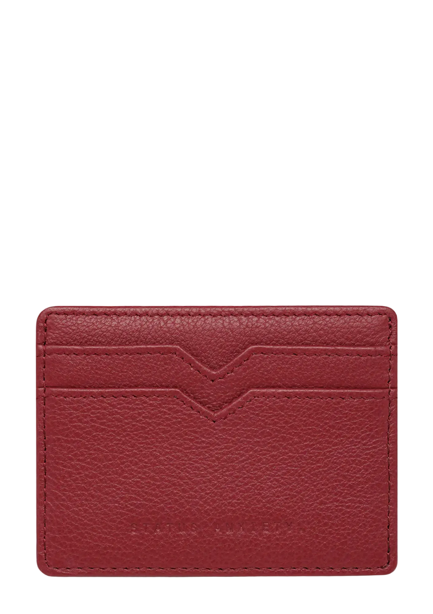 Red leather cardholder on a white background